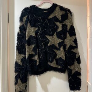 VINTAGE SAINT LAURENT BLACK AND GOLD KNITTED STAR PULL OVER SWEATER
